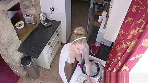 Danielle's Boobs Peek Out While Cleaning Up