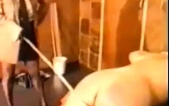 lesbian fedmom with caning and strapon