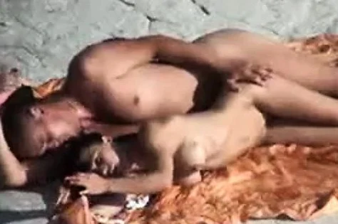 Public beach sex of a voyeur horny couple