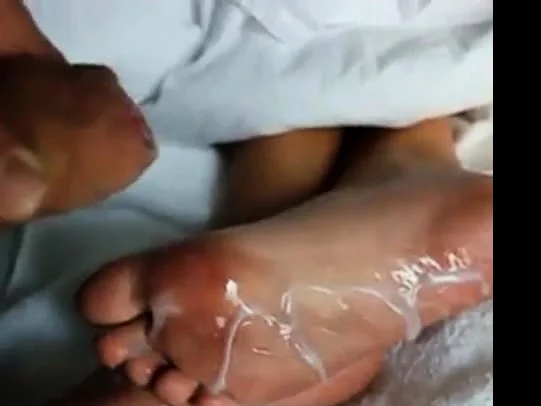 Huge load of cum over Mary's sexy feet soles!