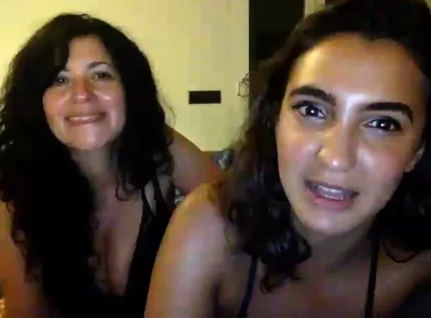 Two sexy brunette lesbians licking each others pussies