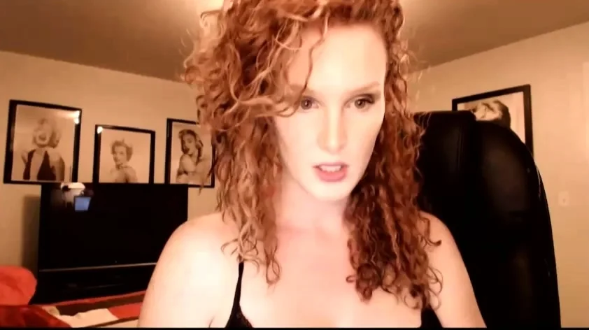 Redheaded amateur MILF with a sex toy on webcam show