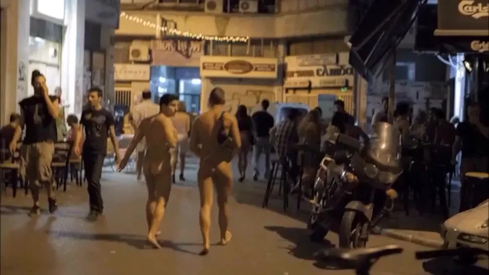I enjoyed walking around the town with my friend completely naked