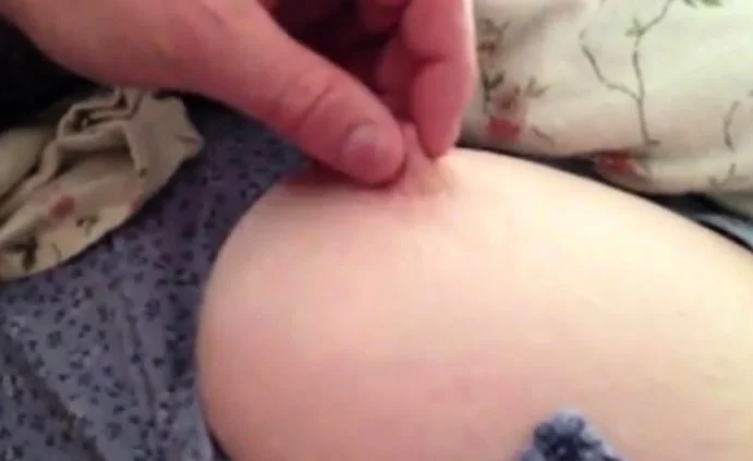sneaky peep at her big boob as she napps.