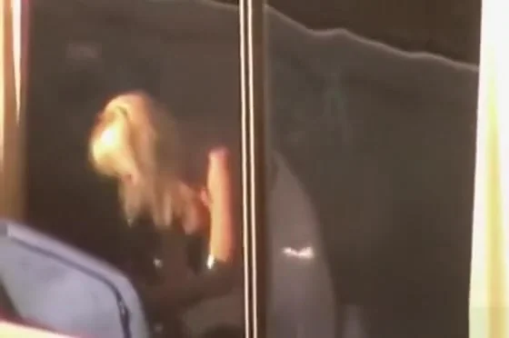 Topless in Window