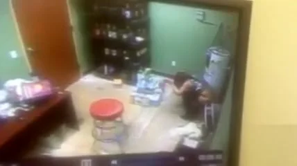 Desperate employee takes a pee in the supply room