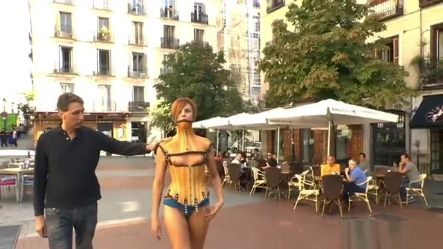 Naked ginger slave led through Madrid