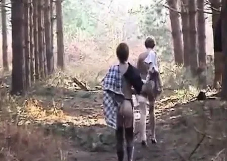 Sara and Jade strip in the woods