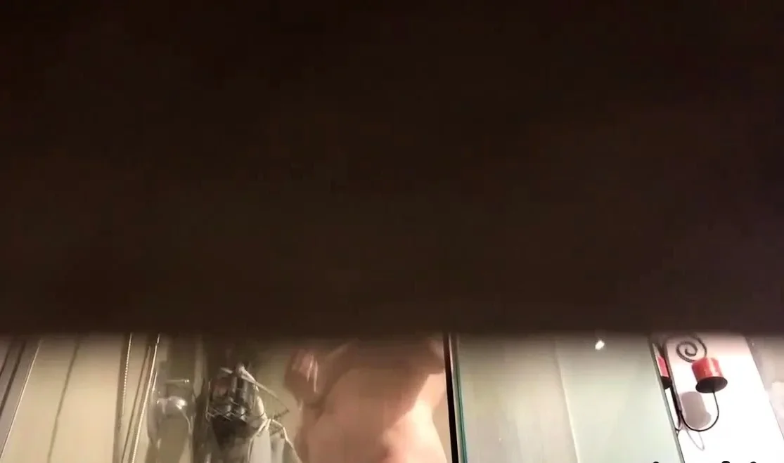Peeking at my sexy showering stepmother