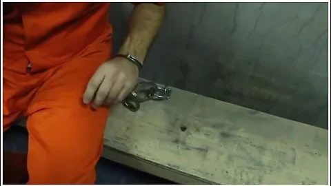 Hogcuffed Prison Guard