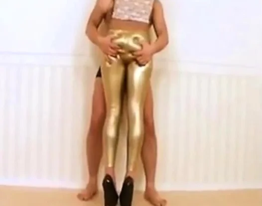 Girl in sexy latex leggings getting naughty with her boy