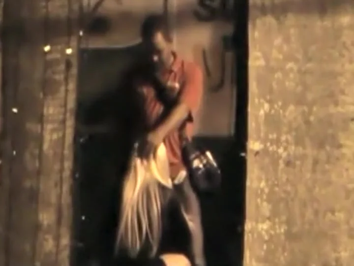 Leggy slut spied sucking dick in an alley