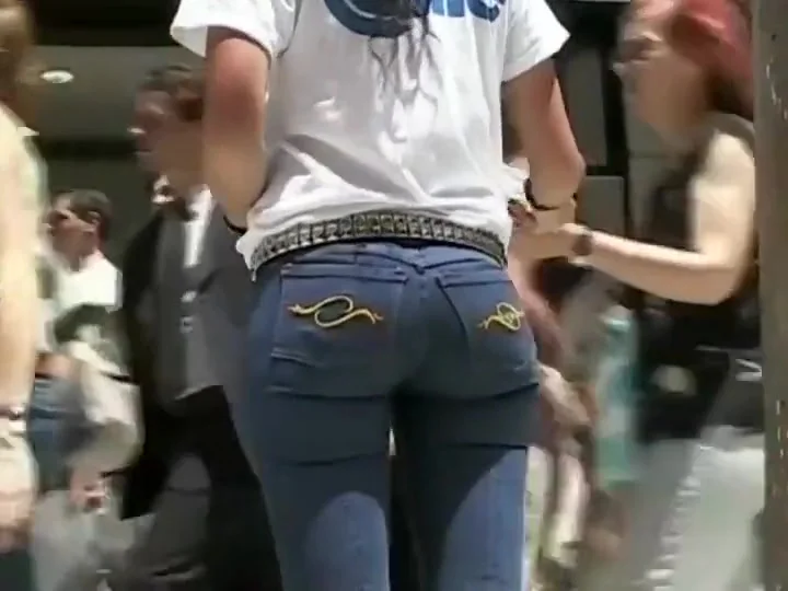 Girl with a sexy ass handing flyers