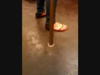Feet in a metro train VII