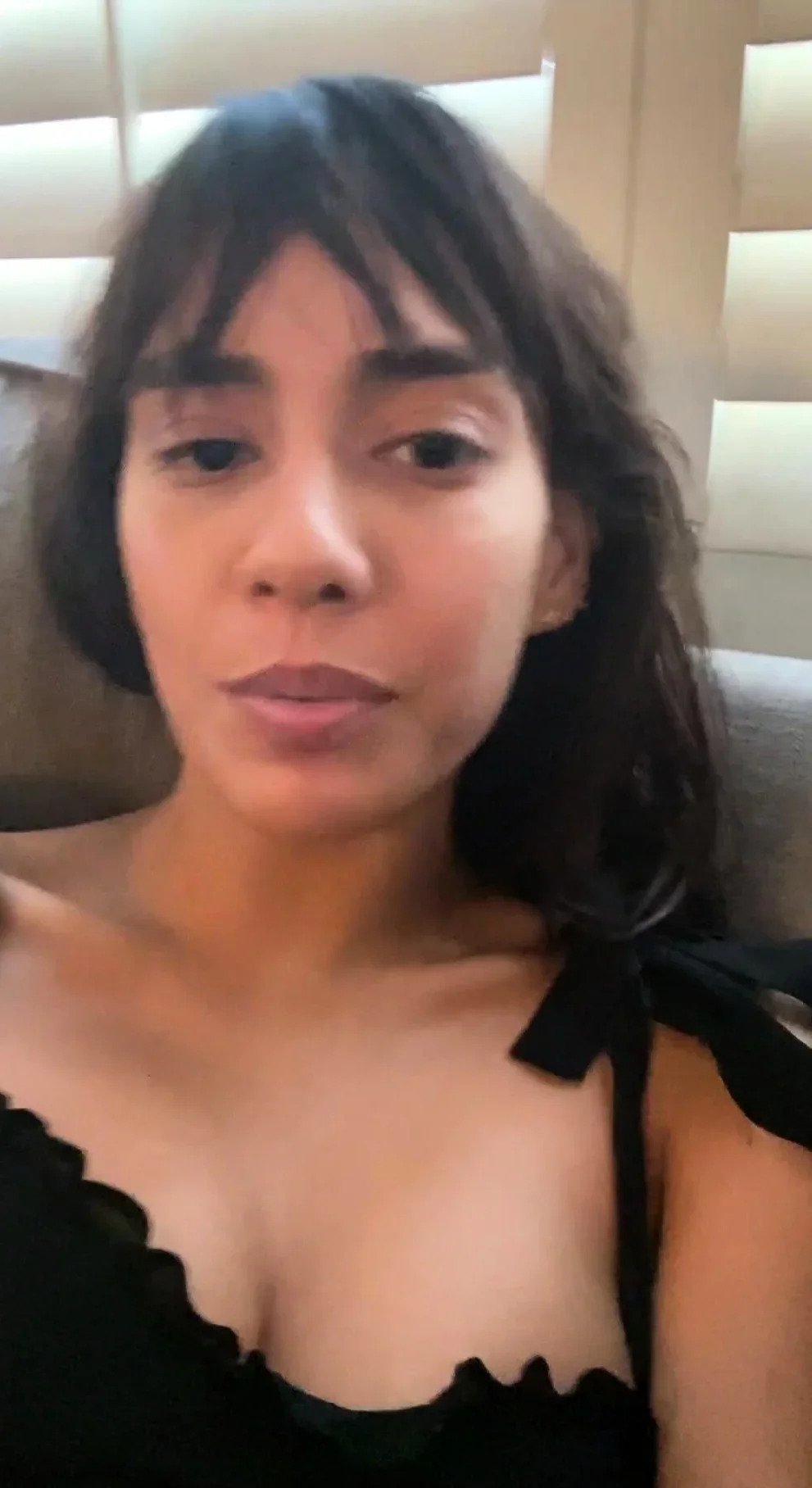 Busty curly brunette with big boobs fucks on couch