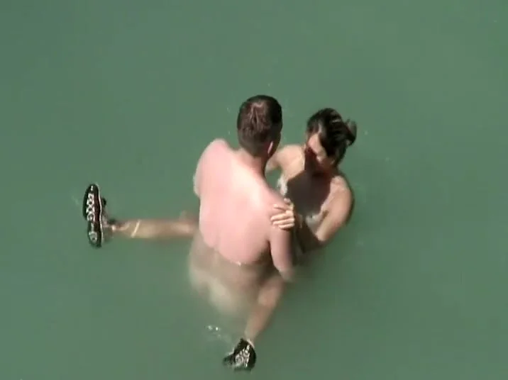 notices they fuck in the water