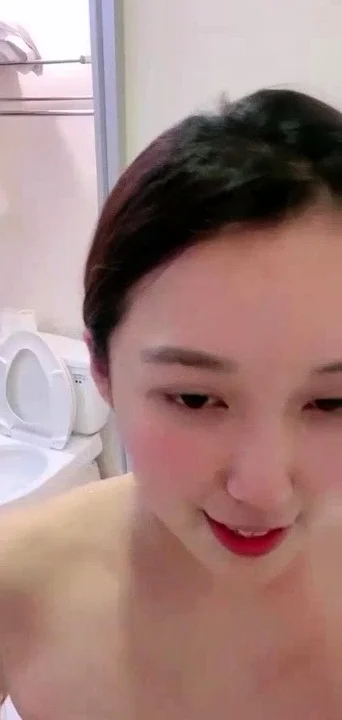 Asian babe sucking and jerking two hard dicks