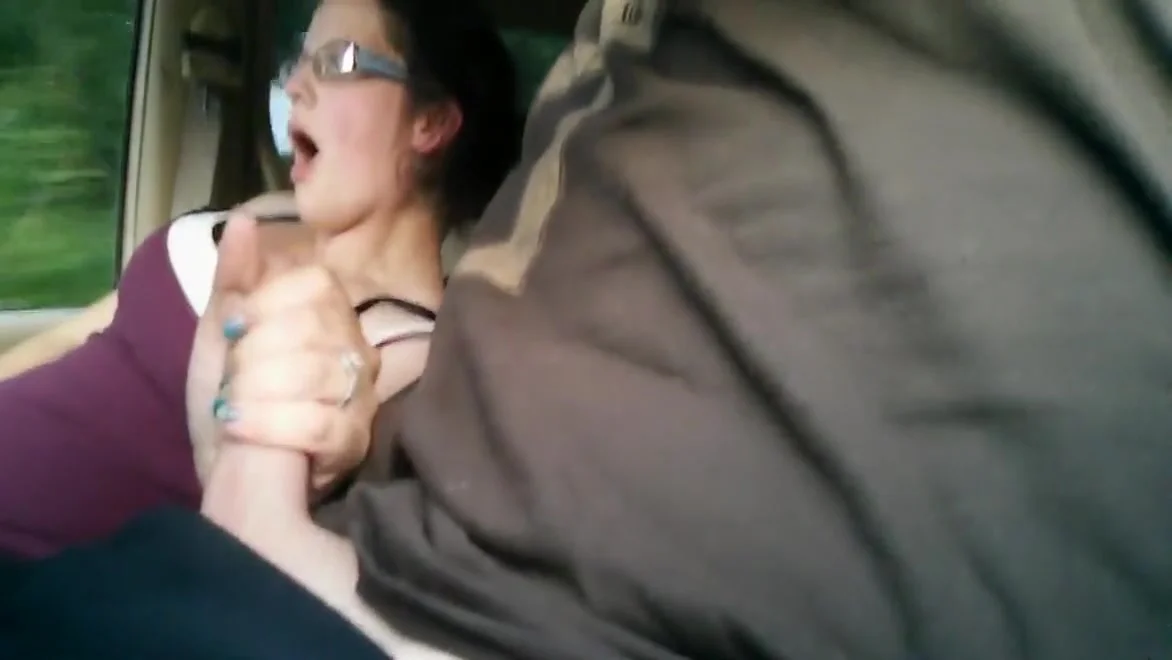 Handjob on the Highway in Car Wife Jerks Off Husband