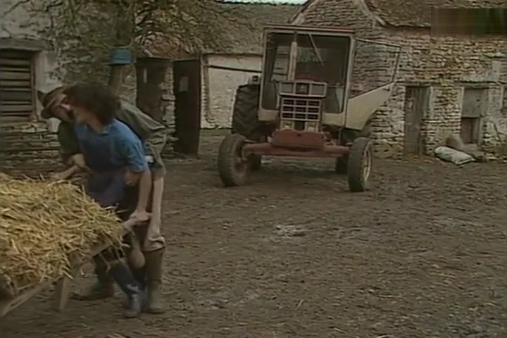 Old farmer has fun with his female employees