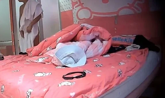 Cute amateur asian web cam girl playing with her toy