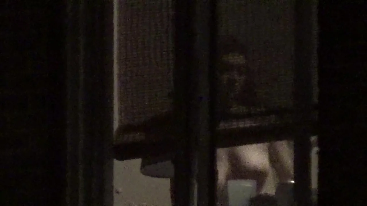 Neighbor's tits through apartment window