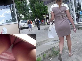 Upskirt gets under the super tight skirt