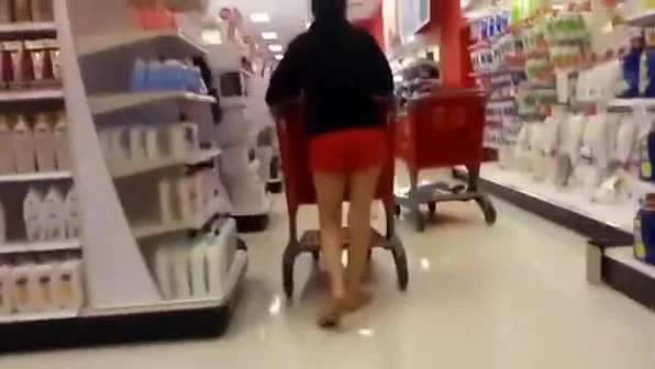 Red shorts chick at supermarket