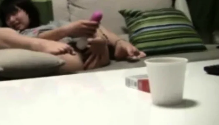 Japanese stepdaughter caught toying on the couch
