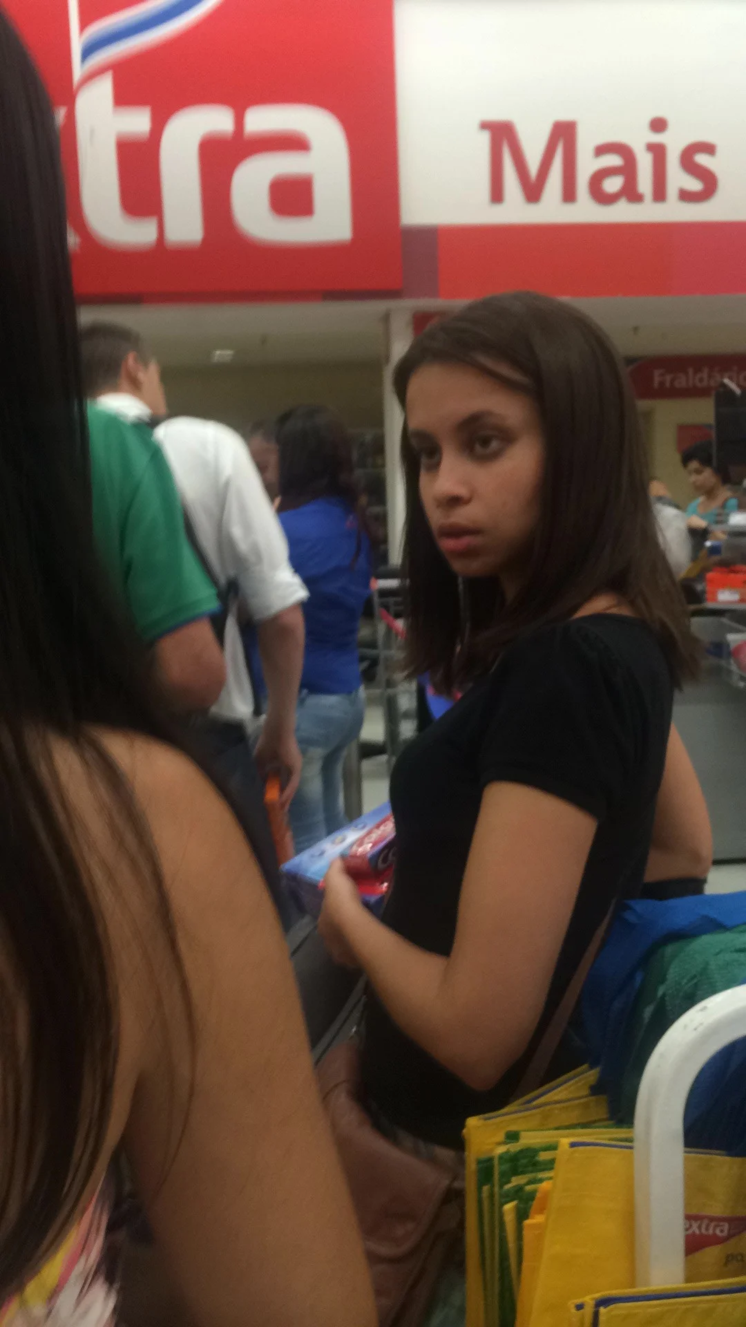 In the supermarket with colorful skirt