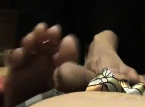 Amateur Asian Girl footjob during phone call