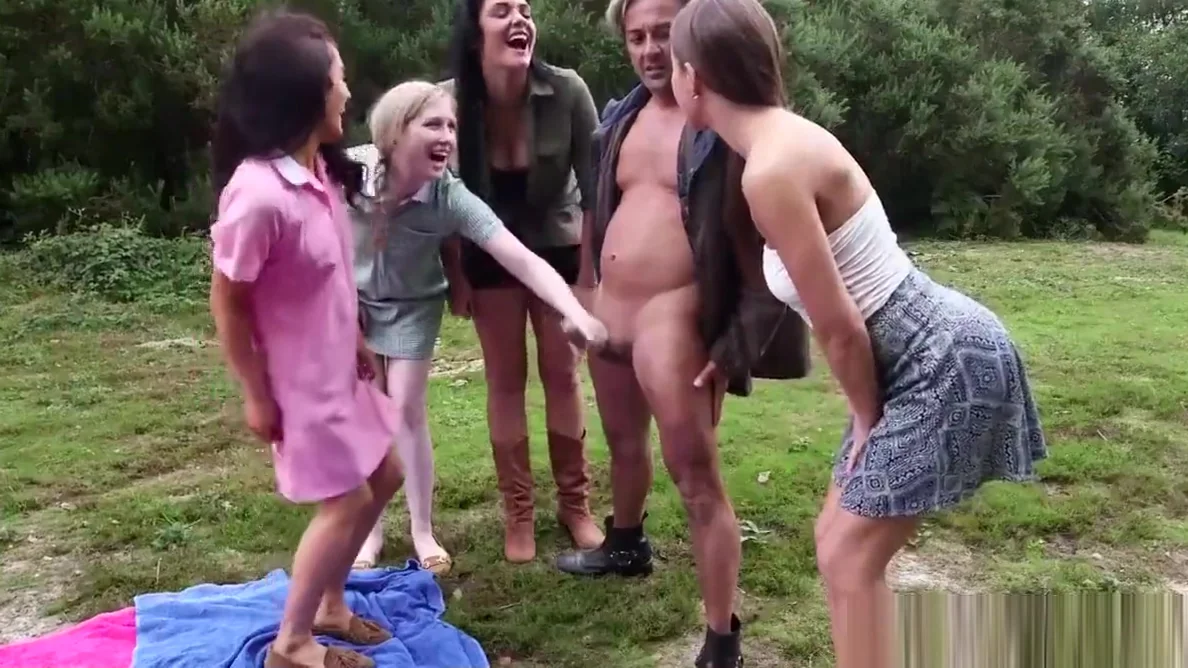 Femdoms jerking cfnm sub outdoors in group