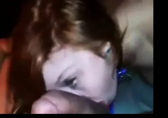 Collared and leashed redhead worships cock and balls