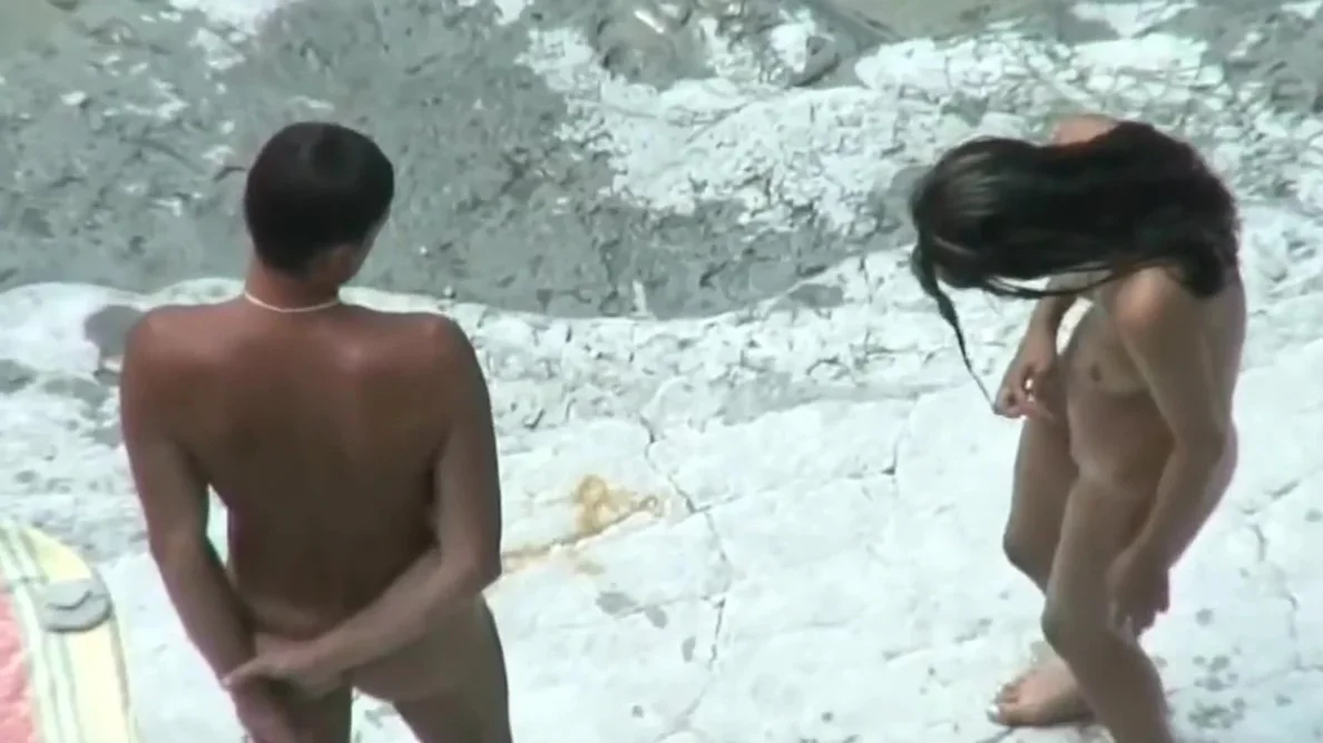 Naked Couple Enjoy A Day At The Beach