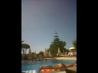 Topless girl in pool