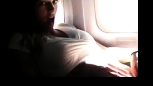 Girl is getting wet in private plane