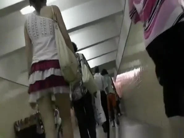 Sexy legs and ass under short skirt
