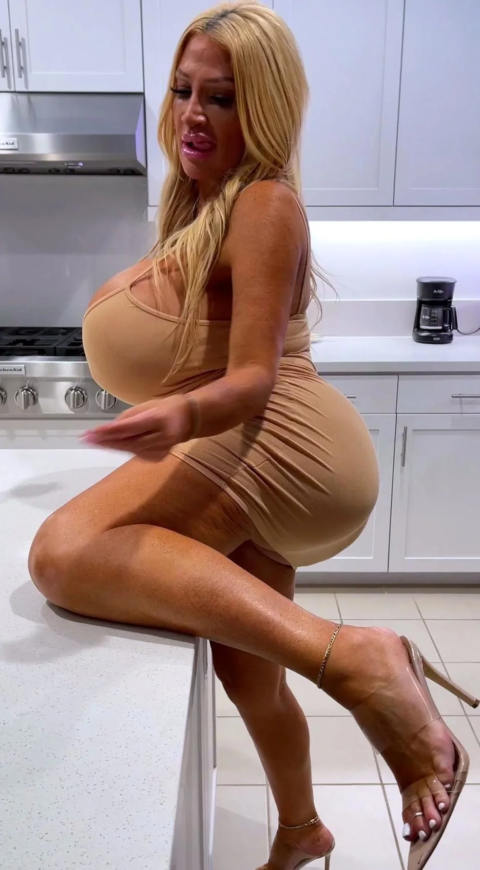 Big Boobed Blonde Masturbates With A Dildo In The Bathroom