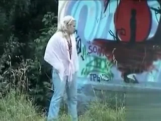 Two blondes go to take a leak