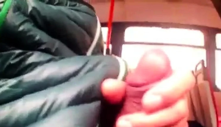 Two girls watch bus flasher