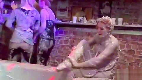 Tarra and her friends just love mud wrestling