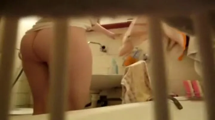 Secretly filming as she showers off