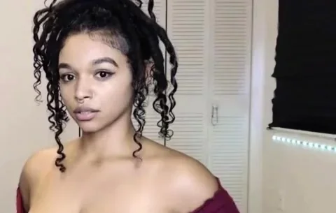 Busty Ebony masturbating with her Lush