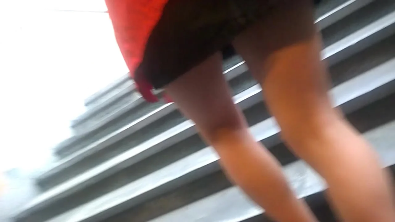 Upskirt in yellow skirt
