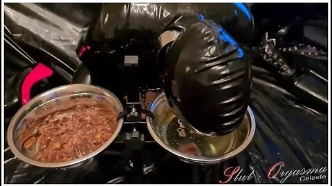 Slave In Black Latex Eating Dog Food And Drinking Piss