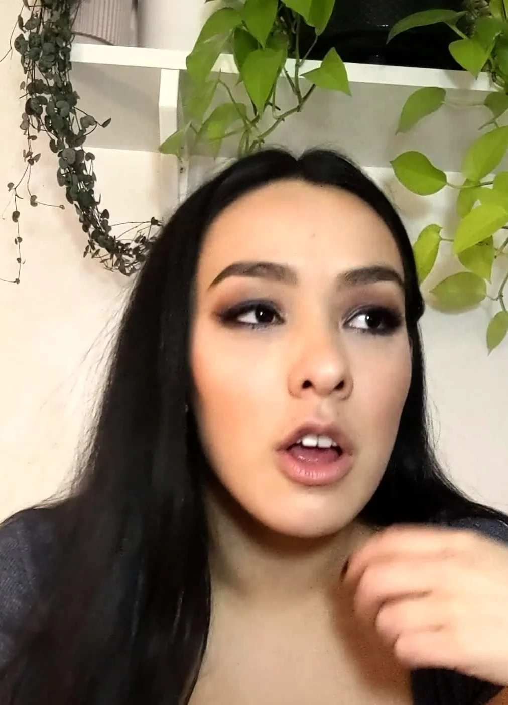 Busty curly brunette with big boobs fucks on couch