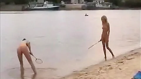 Nude girls outdoor on public beach having fun