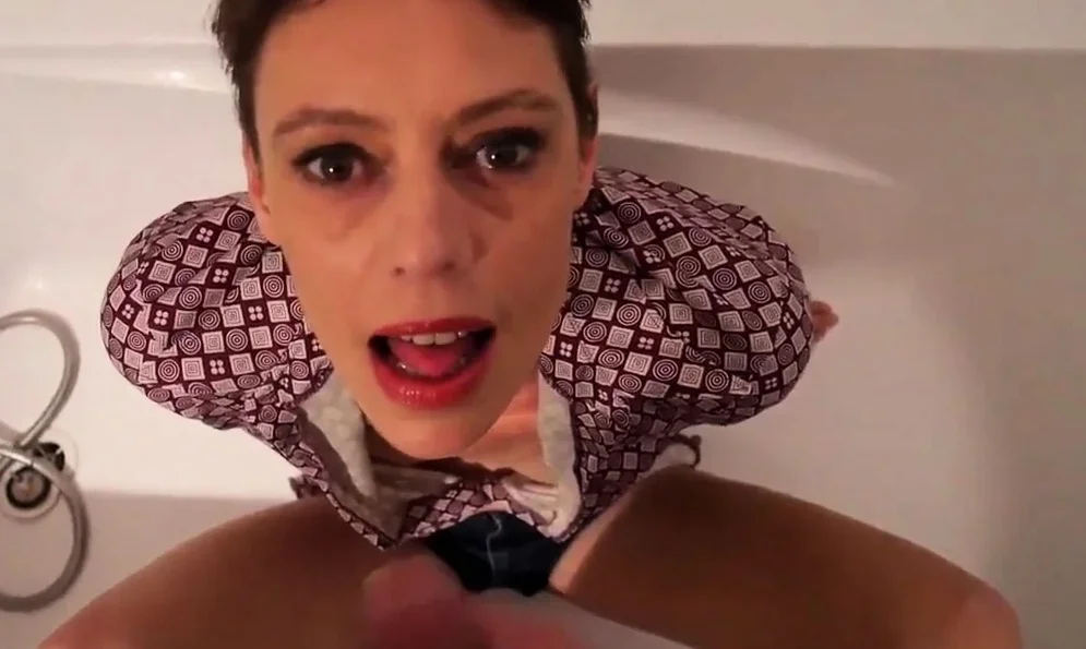 Short hair mature takes facial in the bathtub