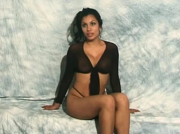 Enticing girl Leilene shows off her big boobs and her wonderful booty