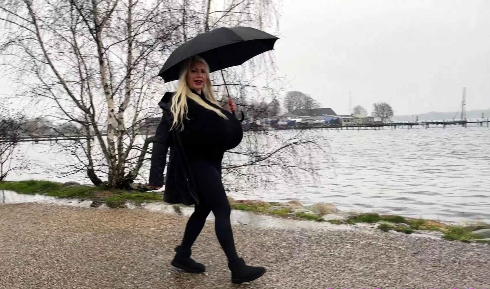 Blonde is flashing her big boobs in the outdoors