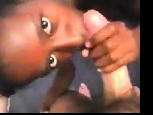 Nasty black bitch sucks cock, licks ass and get spitted on
